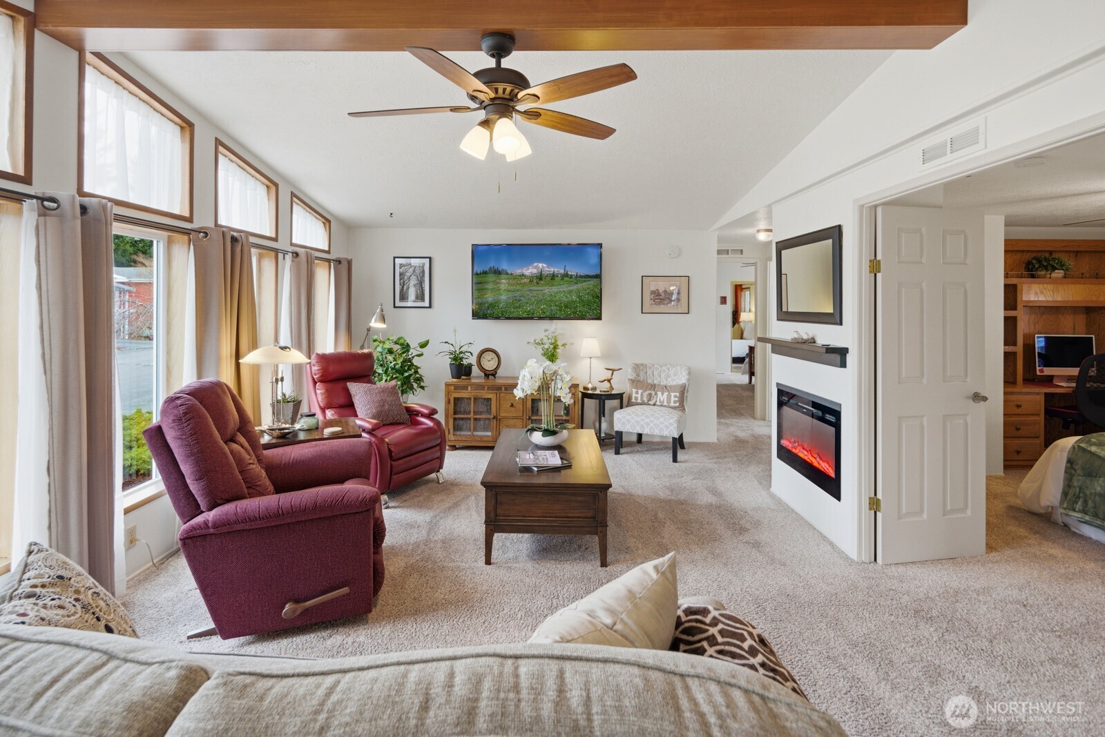 Enter to the vaulted ceilings and large view windows that create a bright & airy atmosphere that showcases all this home has to offer.