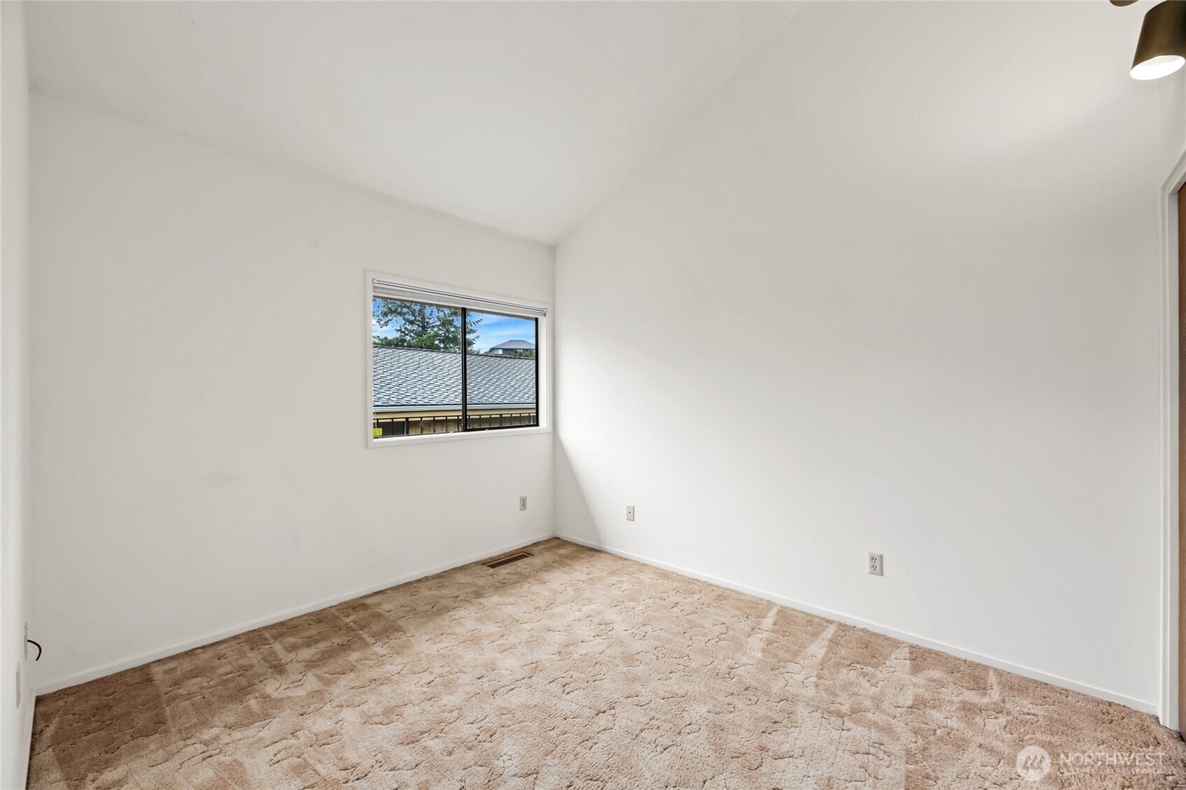 Bedroom #2 with large closet, access to hall bathroom, vaulted ceiling