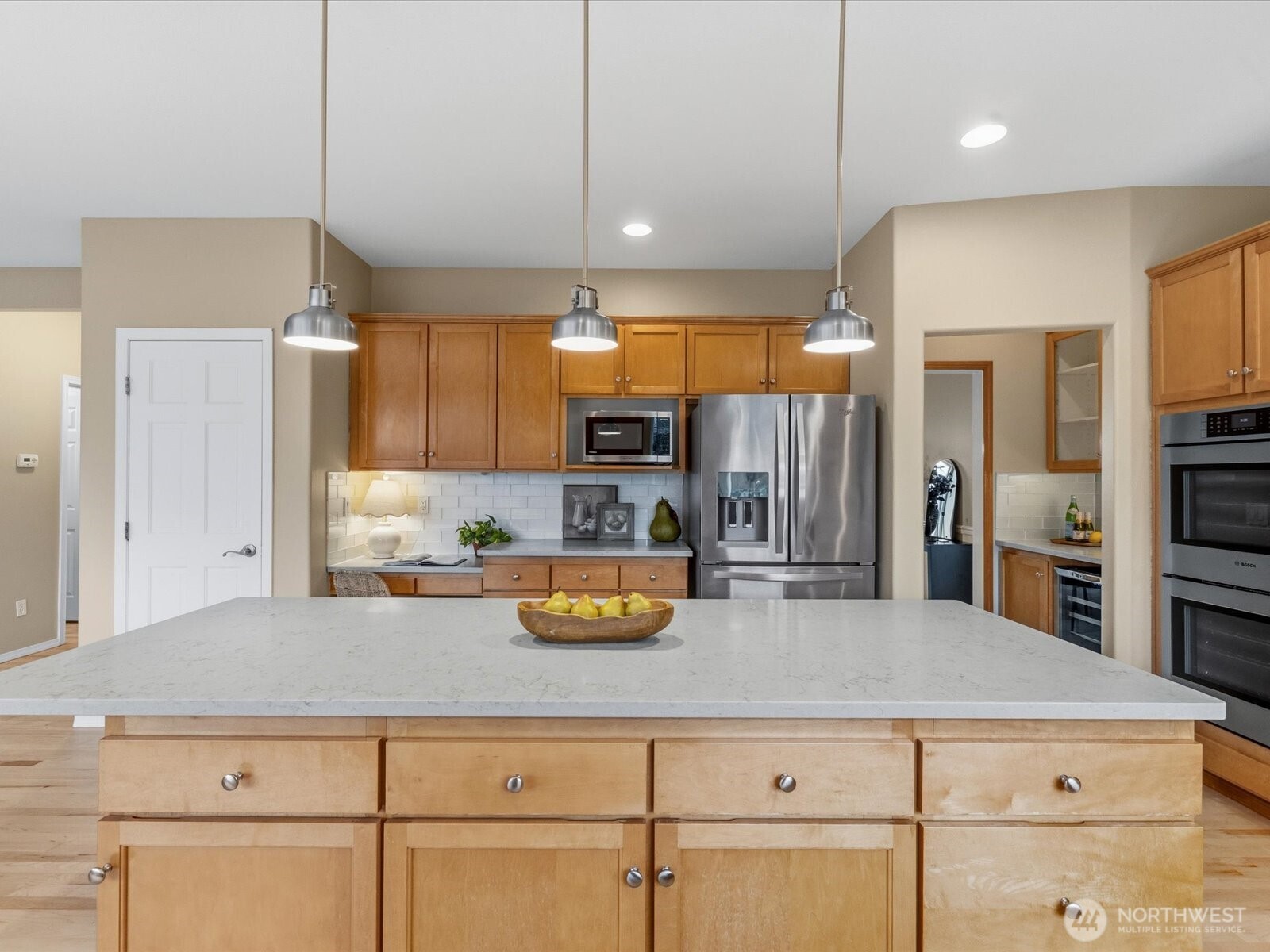 All bathed in natural light from large windows.