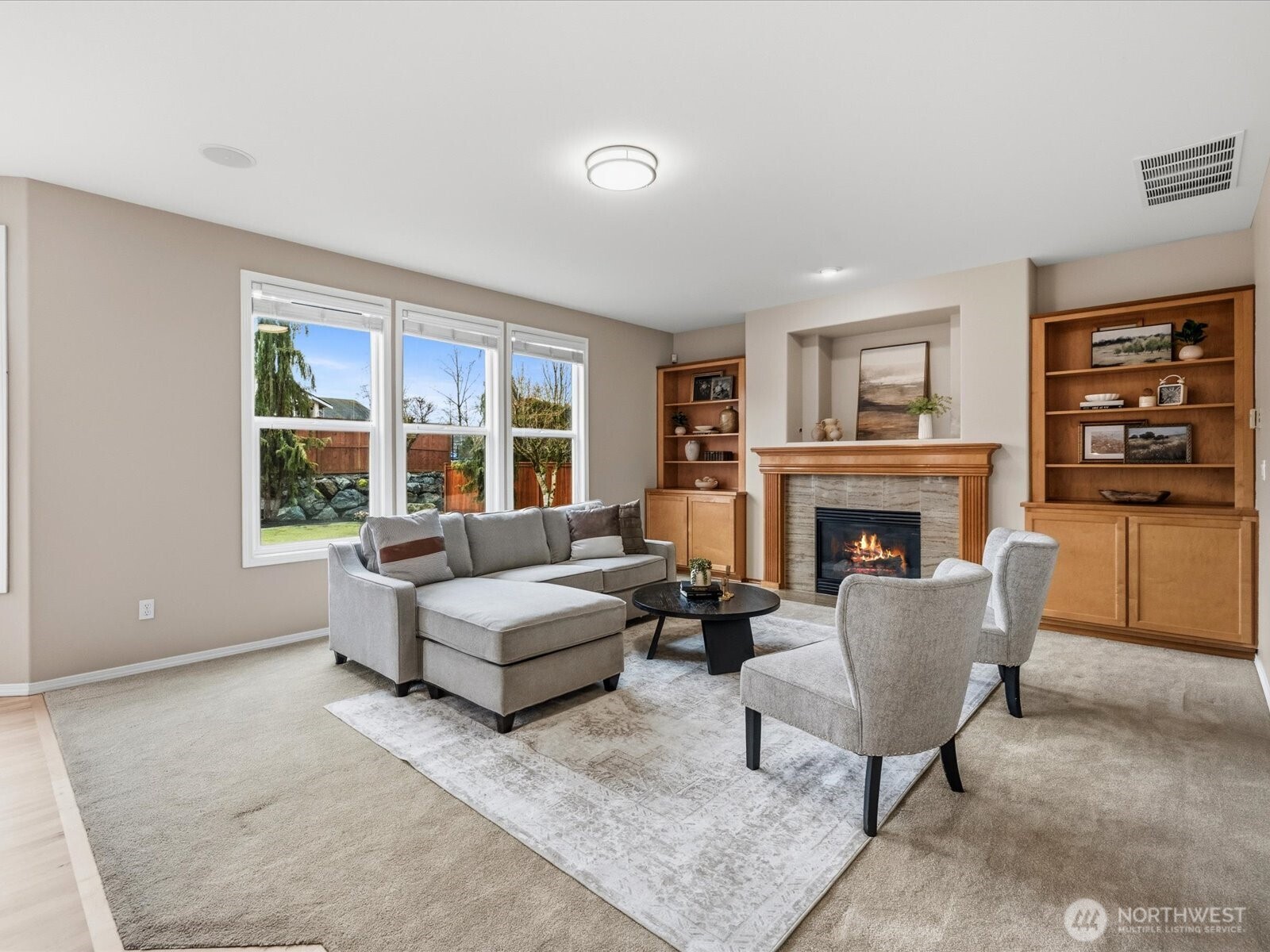 The pass through features a wine fridge.