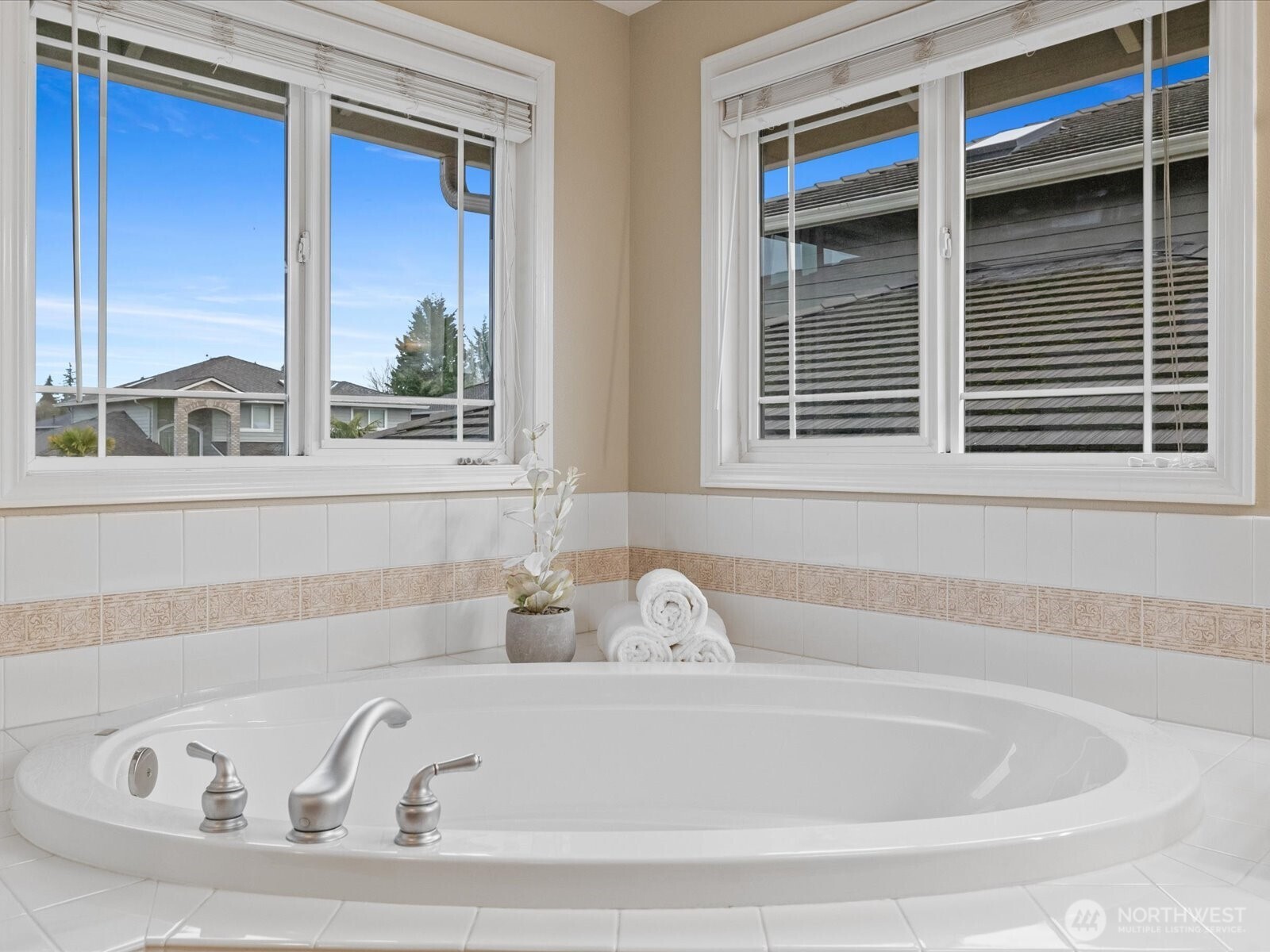 Spacious and elegant primary suite with refined touches.