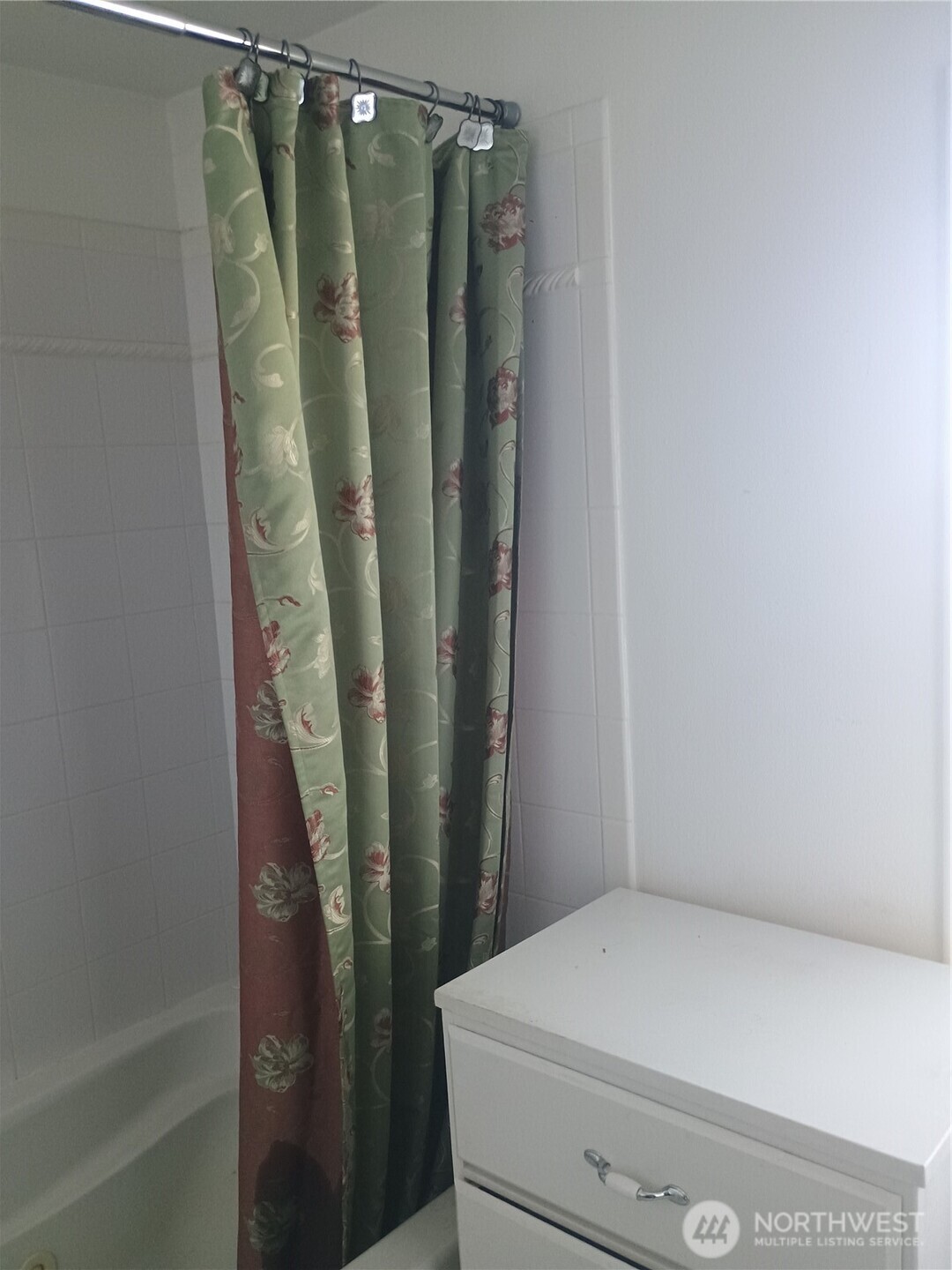 Ensuite master bath with jetted tub, ceramic tile tub surround