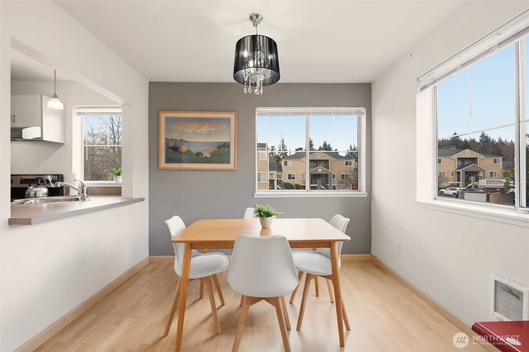 Spacious dining room with breakfast bar pass through into the kitchen.