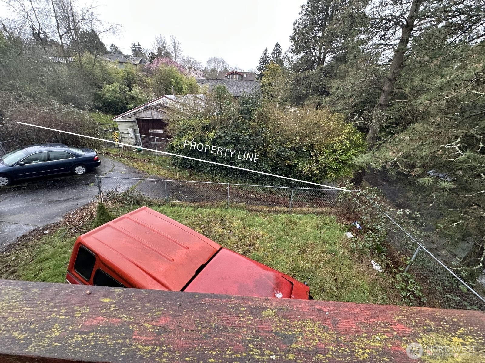 Rear Driveway goes down to the alley to the right.