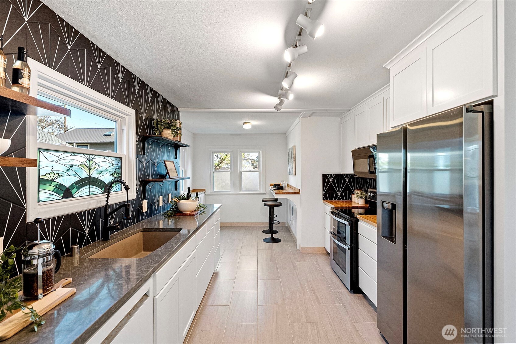 Tastefully updated kitchen with additional eating nook.