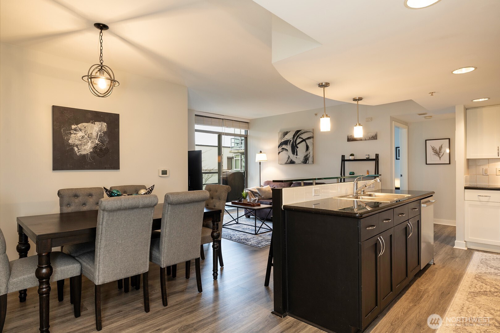 Unit has separate dining and living spaces.