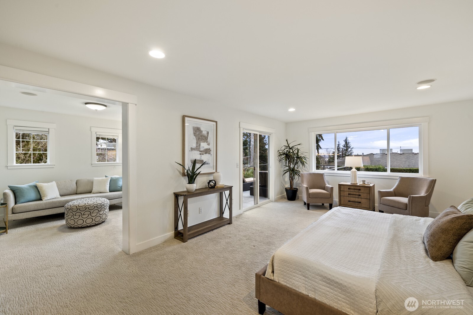 Head upstairs to your luxe primary retreat, complete with a sitting area, a private view deck, a spa-like ensuite bath and a walk-in closet.