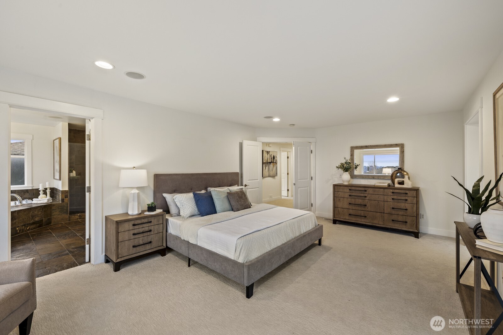 Tons of room for a king-sized bed here, as well as multiple dressers!
