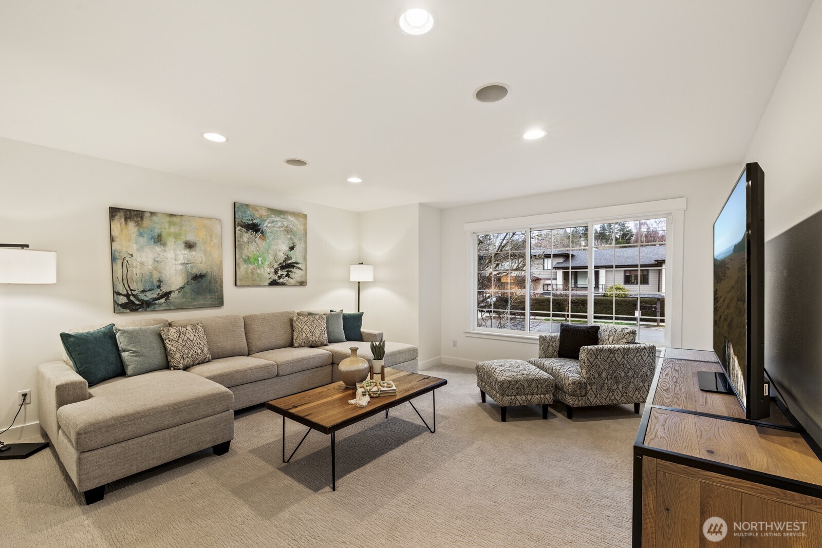 This large upstairs bonus room works great as a media room, a hangout spot for teens, a play area, or an additional bedroom.