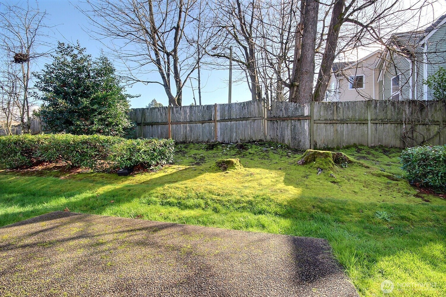 Step out from the dining / family room onto your private patio and green space.