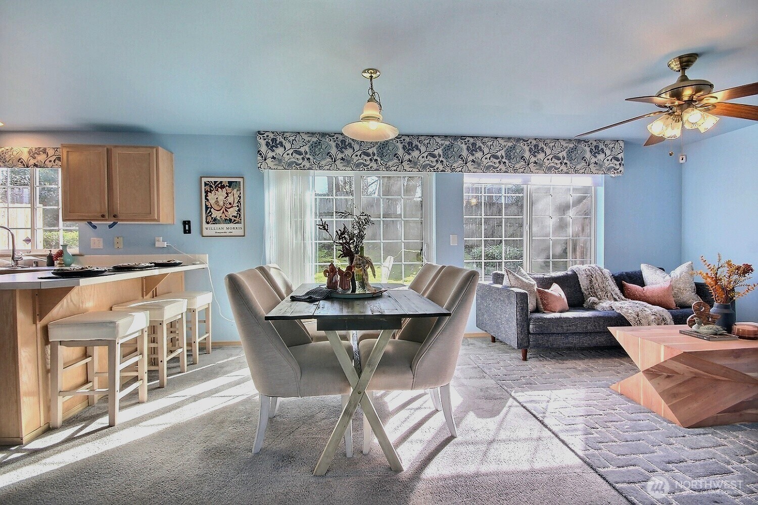 The versatile layout offers plenty of room for a dining table plus a deep kitchen peninsula that's tailor-made for casual bar-stool seating and morning coffee.