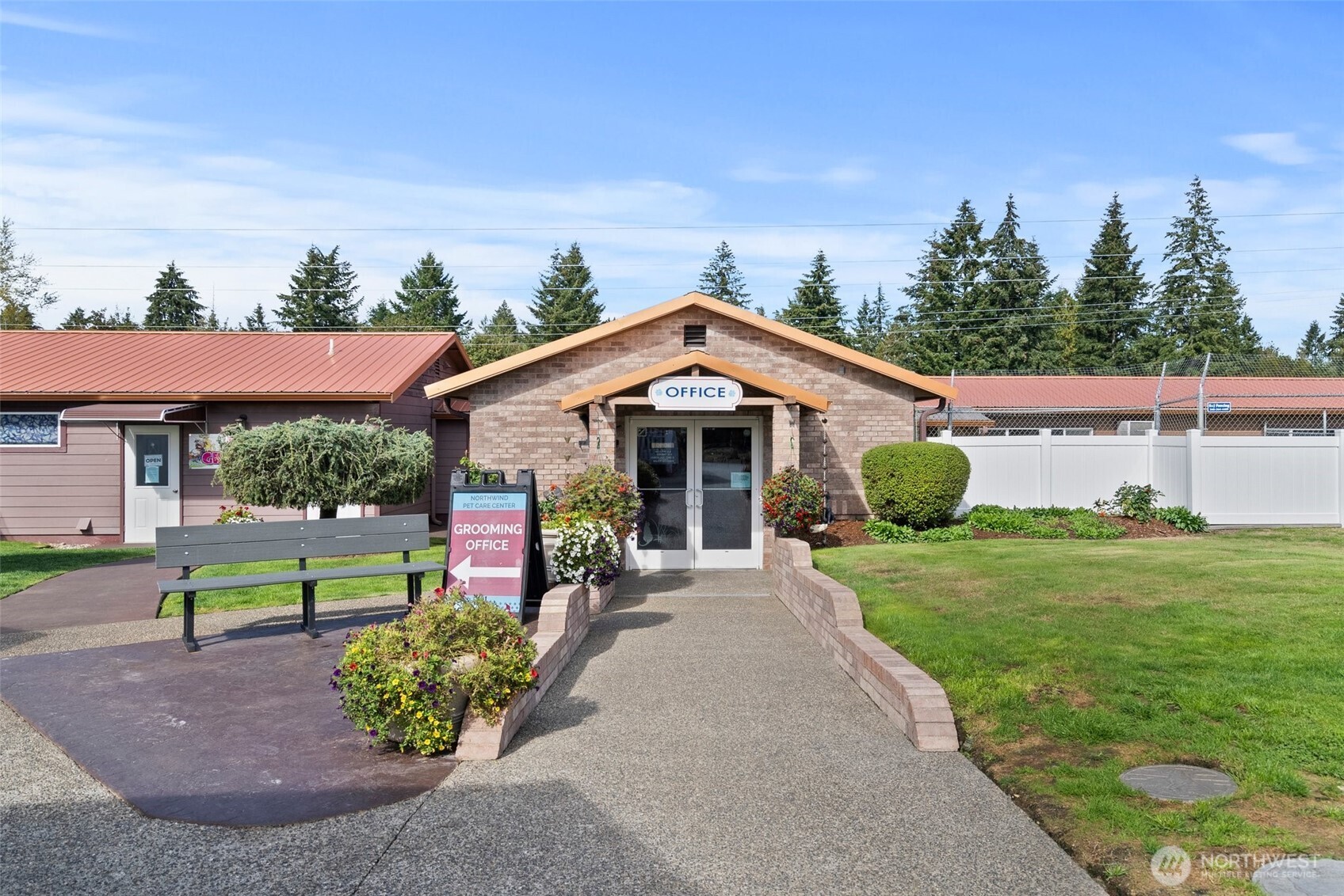 Inviting front entrance of the boarding and kennel office, designed to create a warm and professional first impression. This welcoming space is beautifully landscaped, with easy access and clear signage, ensuring visitors feel at ease from the moment they arrive.