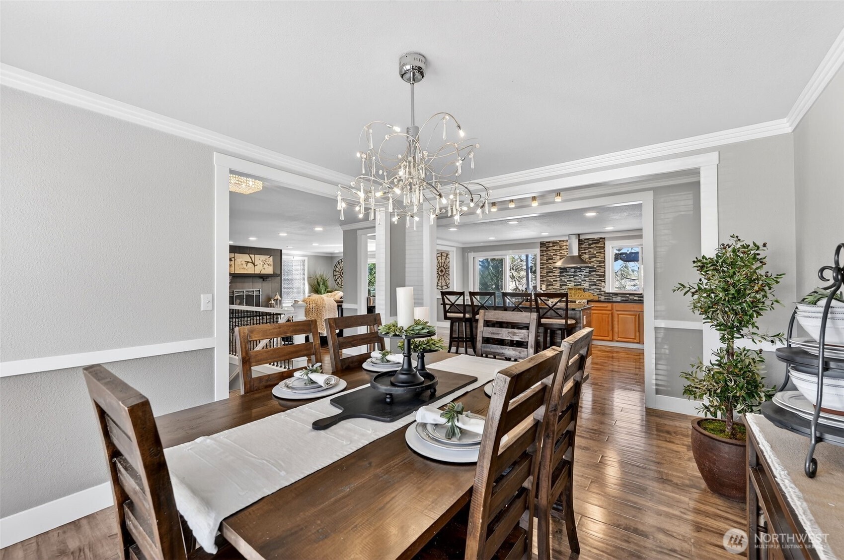 Light-filled spaces, hardwood floor and thoughtful design create a warm, inviting atmosphere.