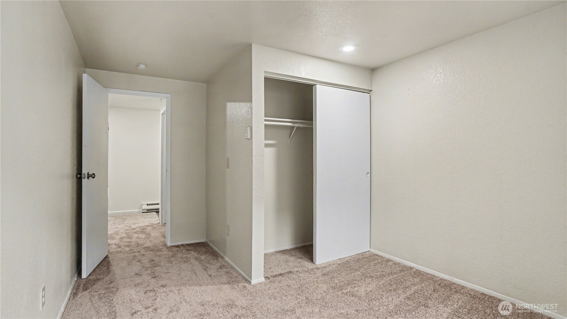 Sizable second guest bedroom.