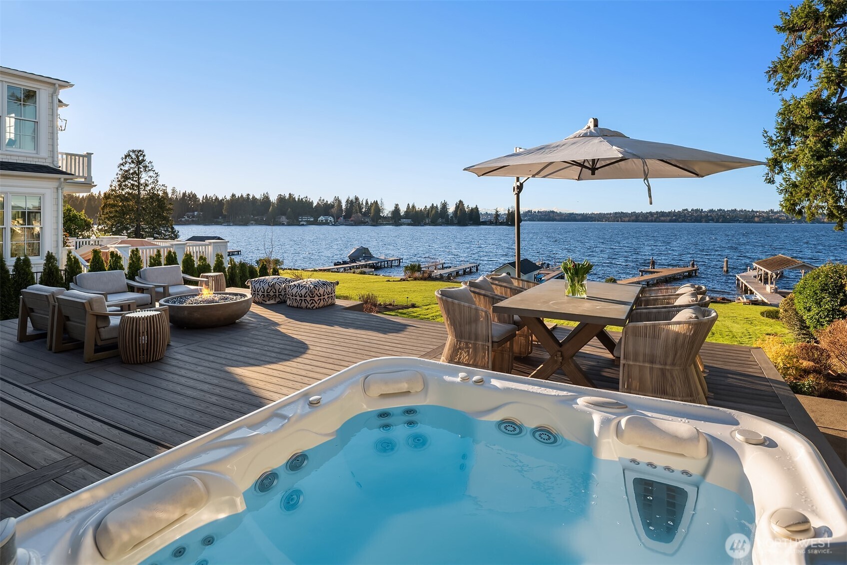 Generous waterfront patio designed for effortless entertaining and relaxation.