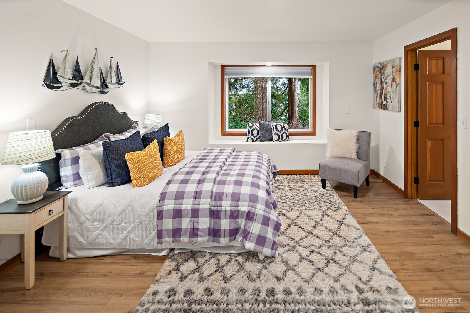 One of the secondary bedrooms with a window seat and en-suite Jack-n-Jill full bath!