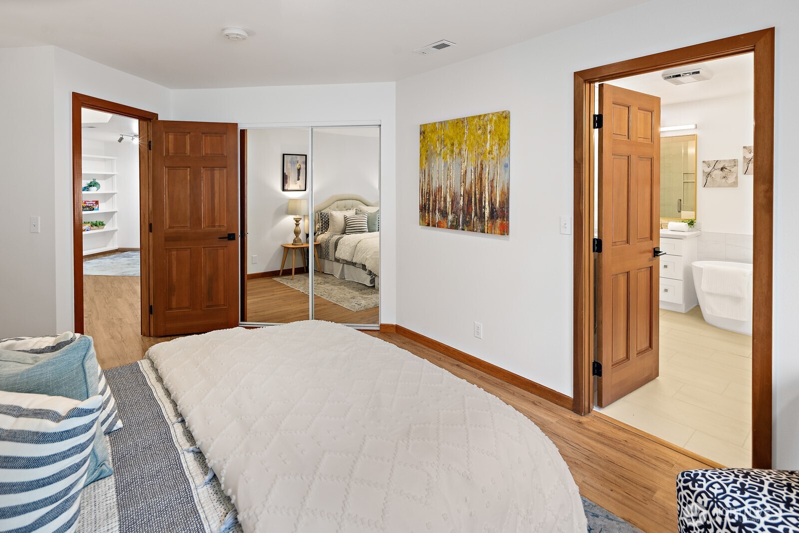 Another secondary bedroom with a window seat and en-suite full bath!