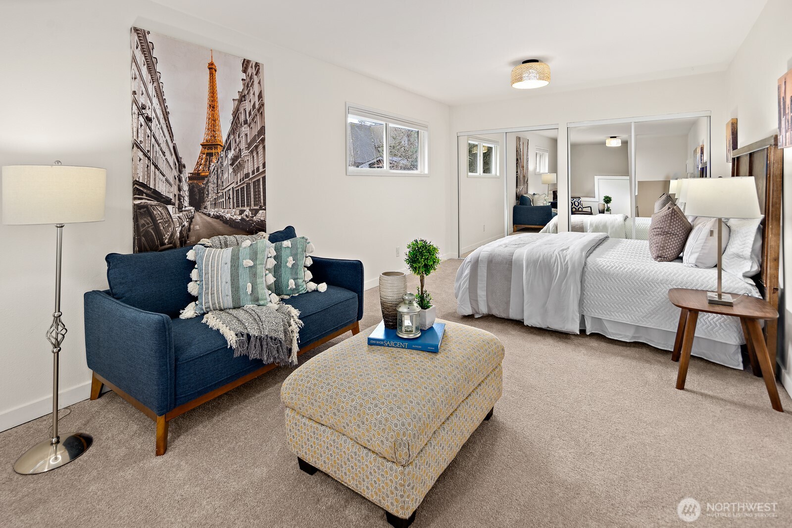 Large 2nd floor bedroom with adorable lighting and tons of storage.