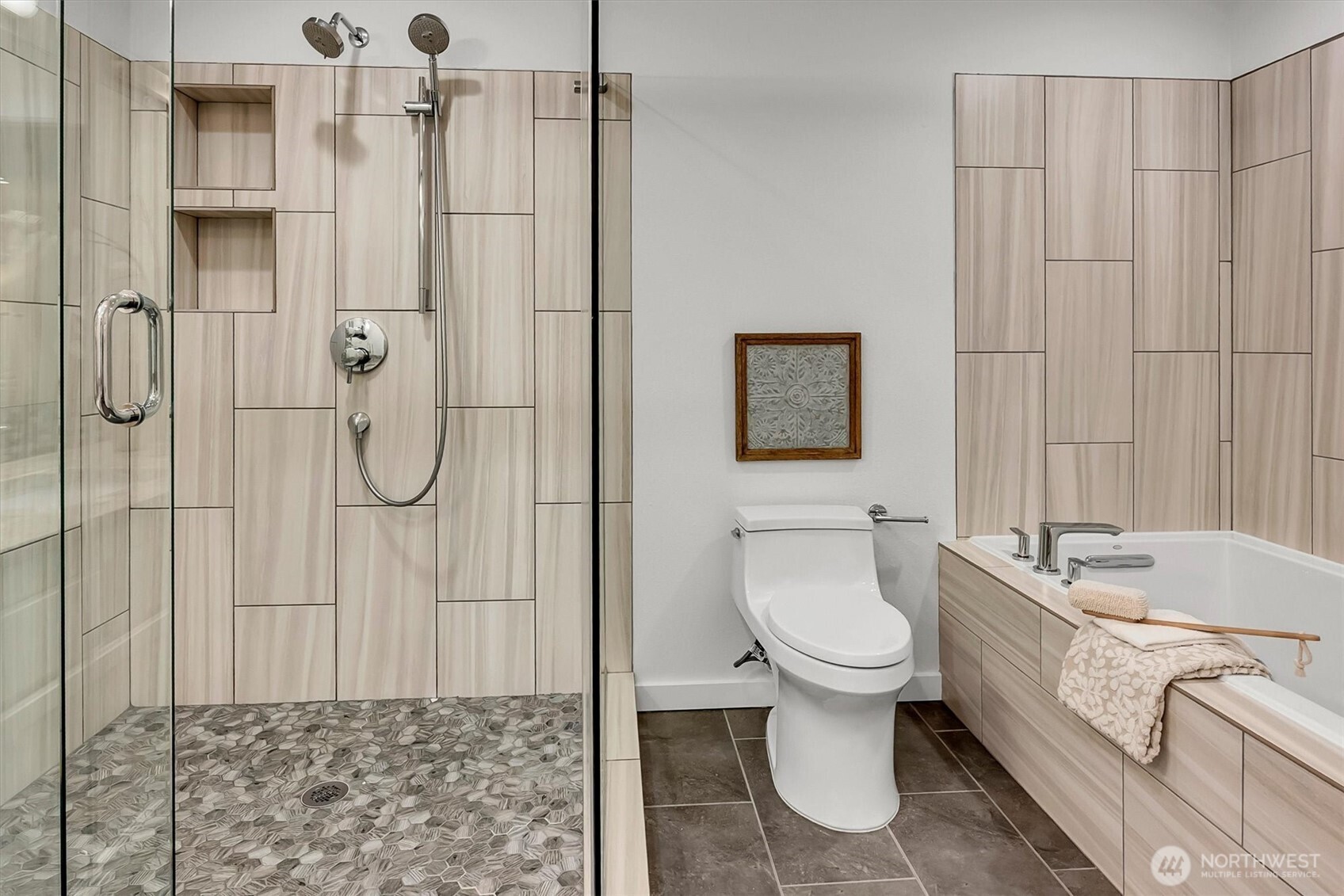 High end custom details will make you fall in love with the primary bathroom! Everything was designed beautifully and the size is grand, no small condo feel here!