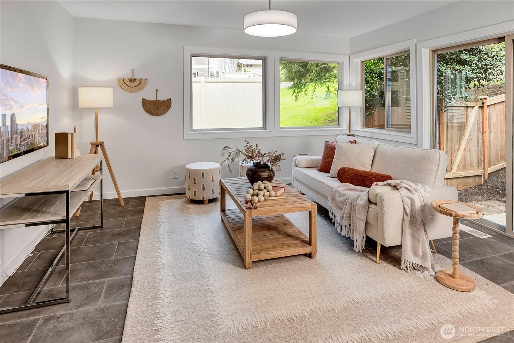 Corner unit w/abundant windows, light...bright and filled with green + nature surround.  The patio is perfectly sized with newer fence surround and gate for easy entry. Ideal for your 4 legged loves!