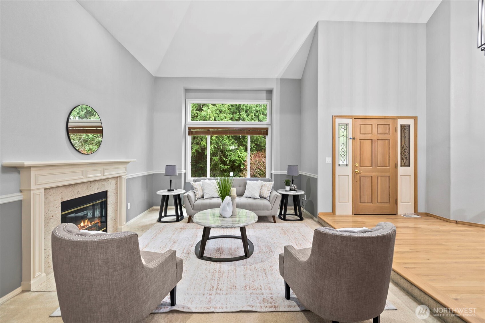 Formal dining with French door access to beautiful wraparound deck.