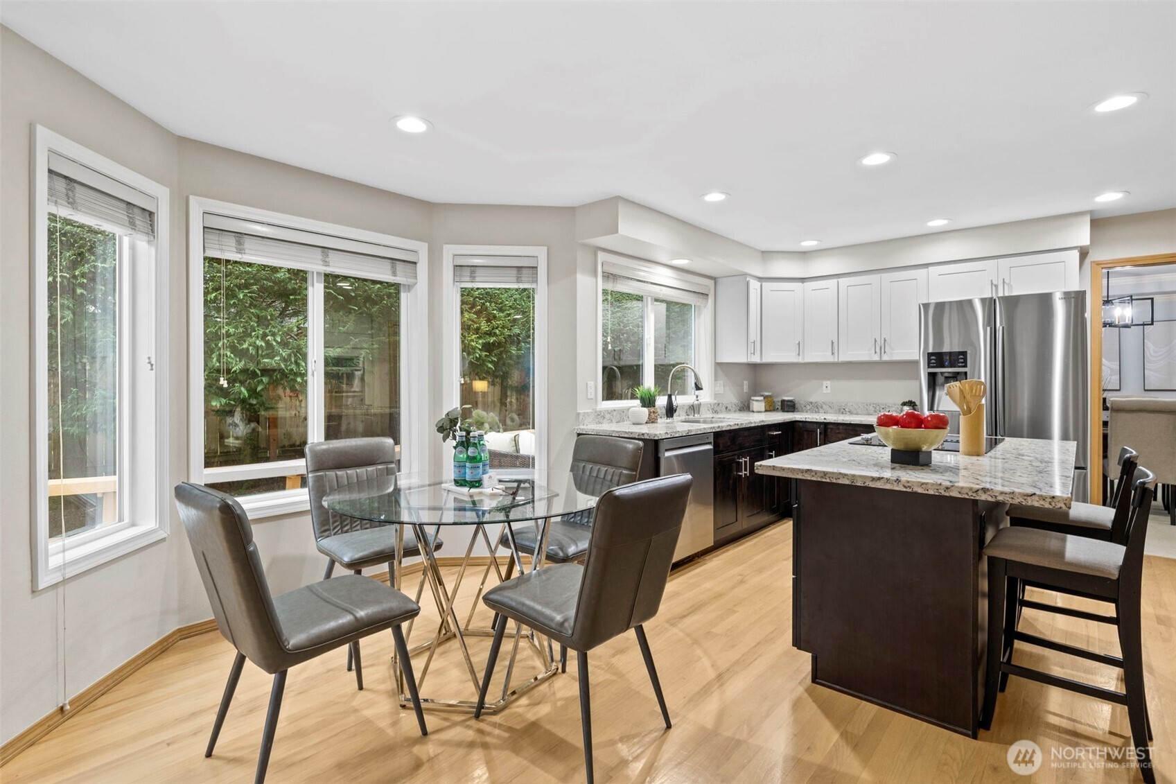 Gleaming maple flooring. Good vibes throughout.