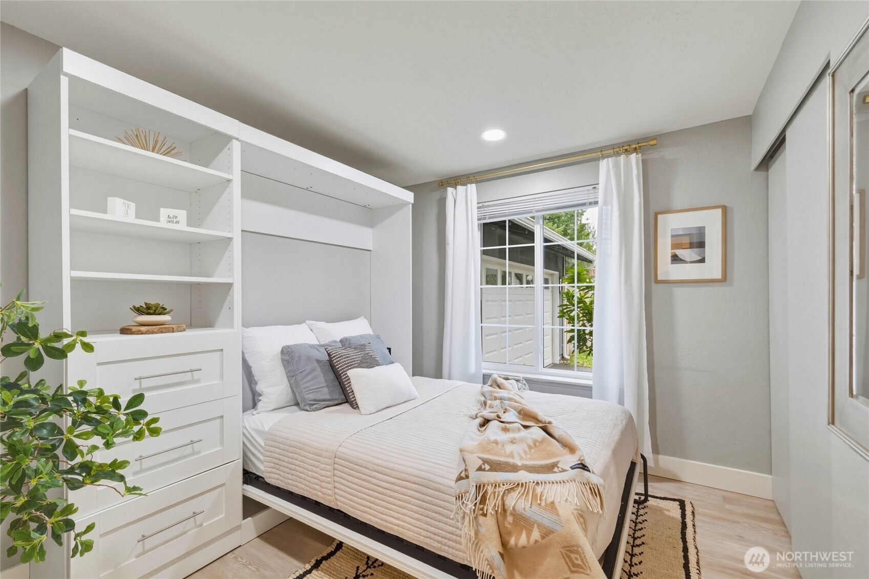 Murphy bed goes with the seller.