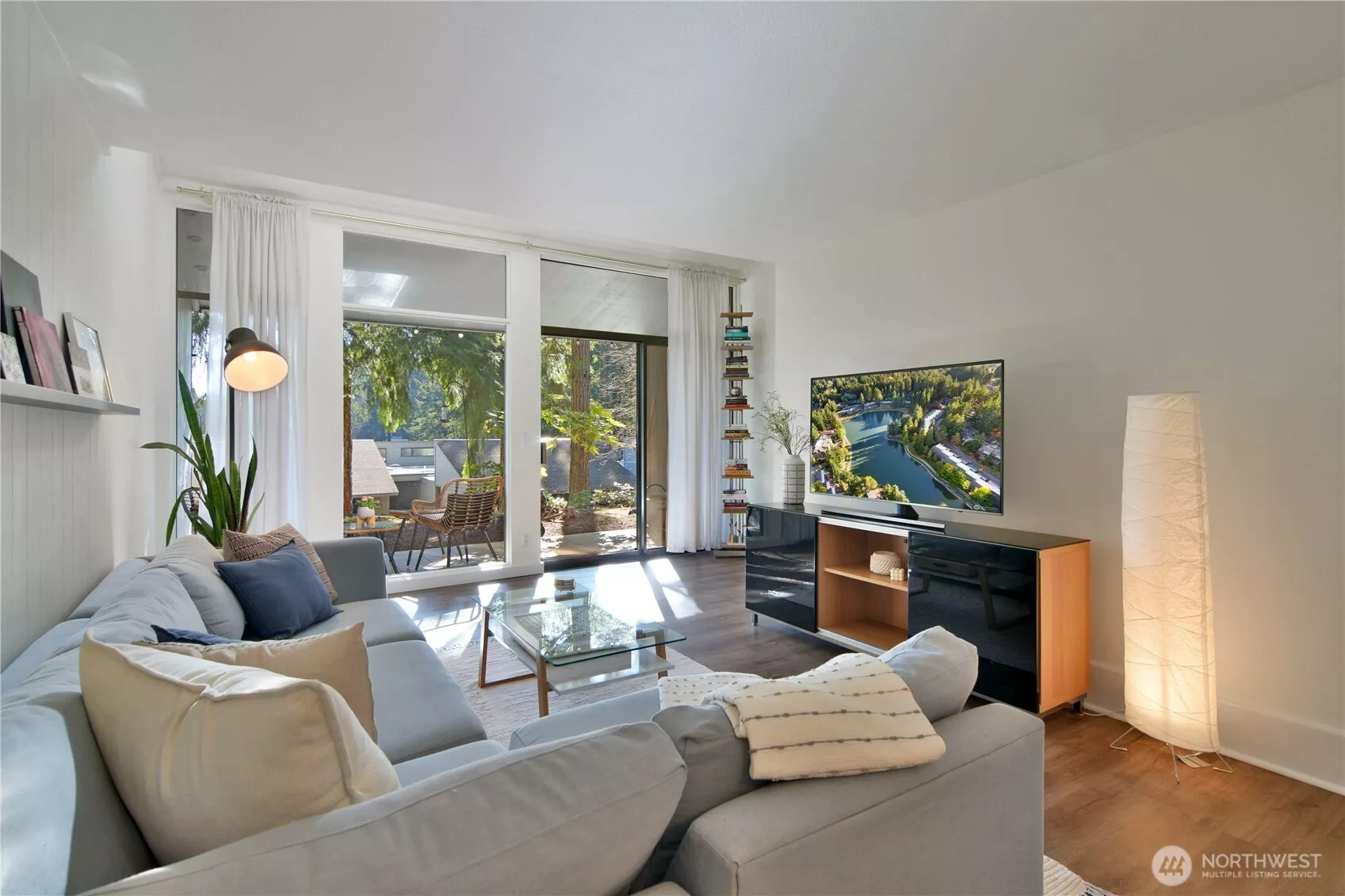 Main living space with floor to ceiling windows