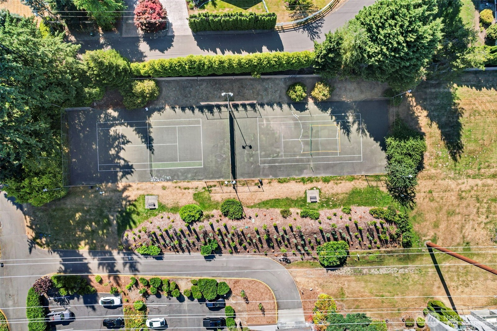 Tennis and volleyball courts! Plenty of guest parking close to this unit