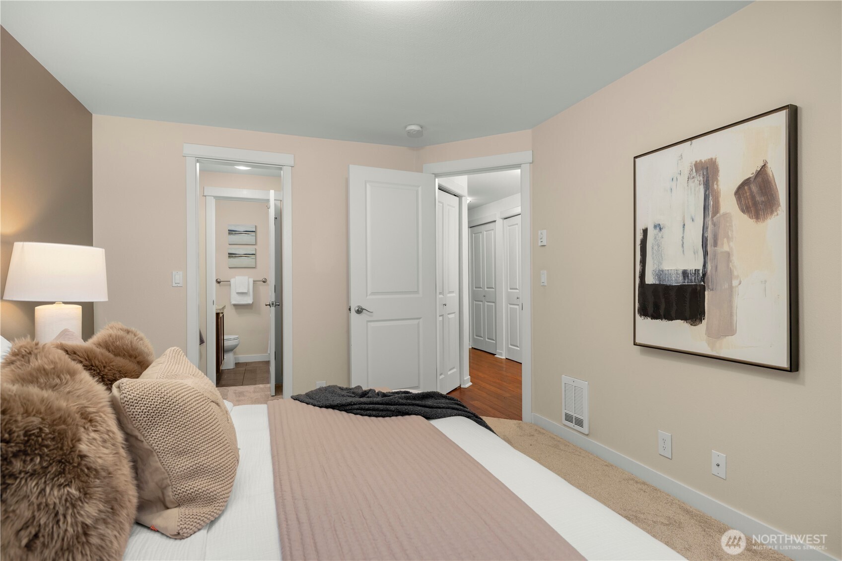 Primary Bedroom. You can see the two closets and primary bathroom.