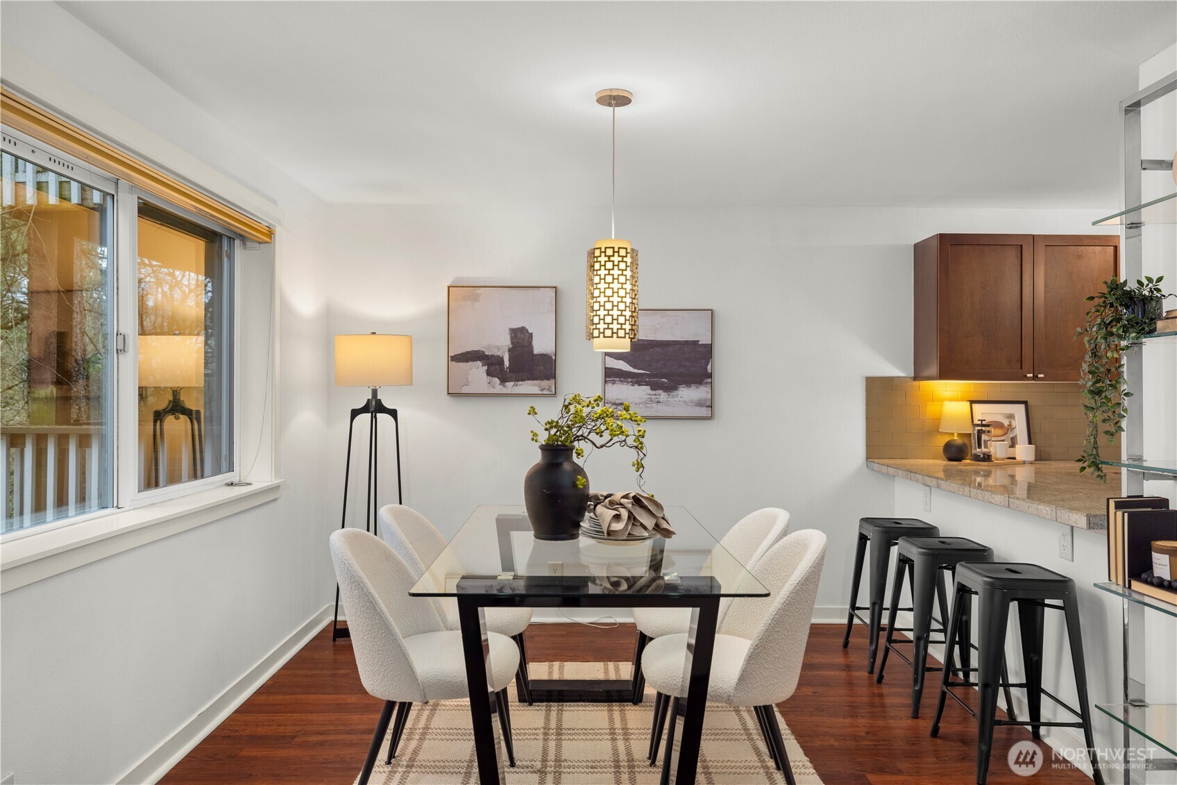 Nice open dining and kitchen space. Bar seating and dining room