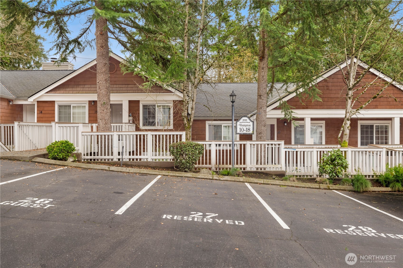 In addition to your garage, you have an additional parking spot. There are 3 guest parking spots in front of your home.