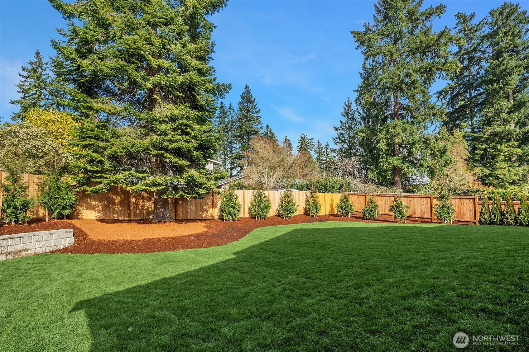 Professional Landscaping  & full irrigation throughout lawn & planting areas