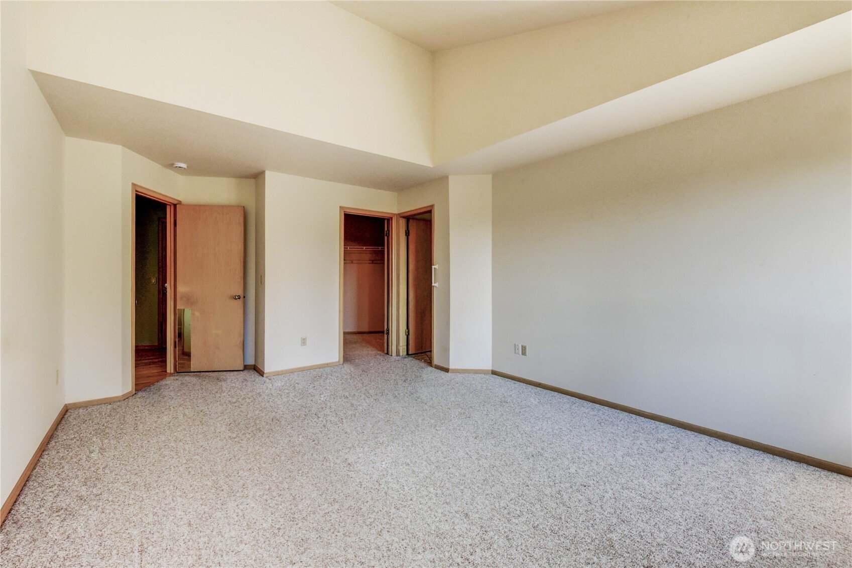 Primary Bedroom w/ Vaulted Ceilings
