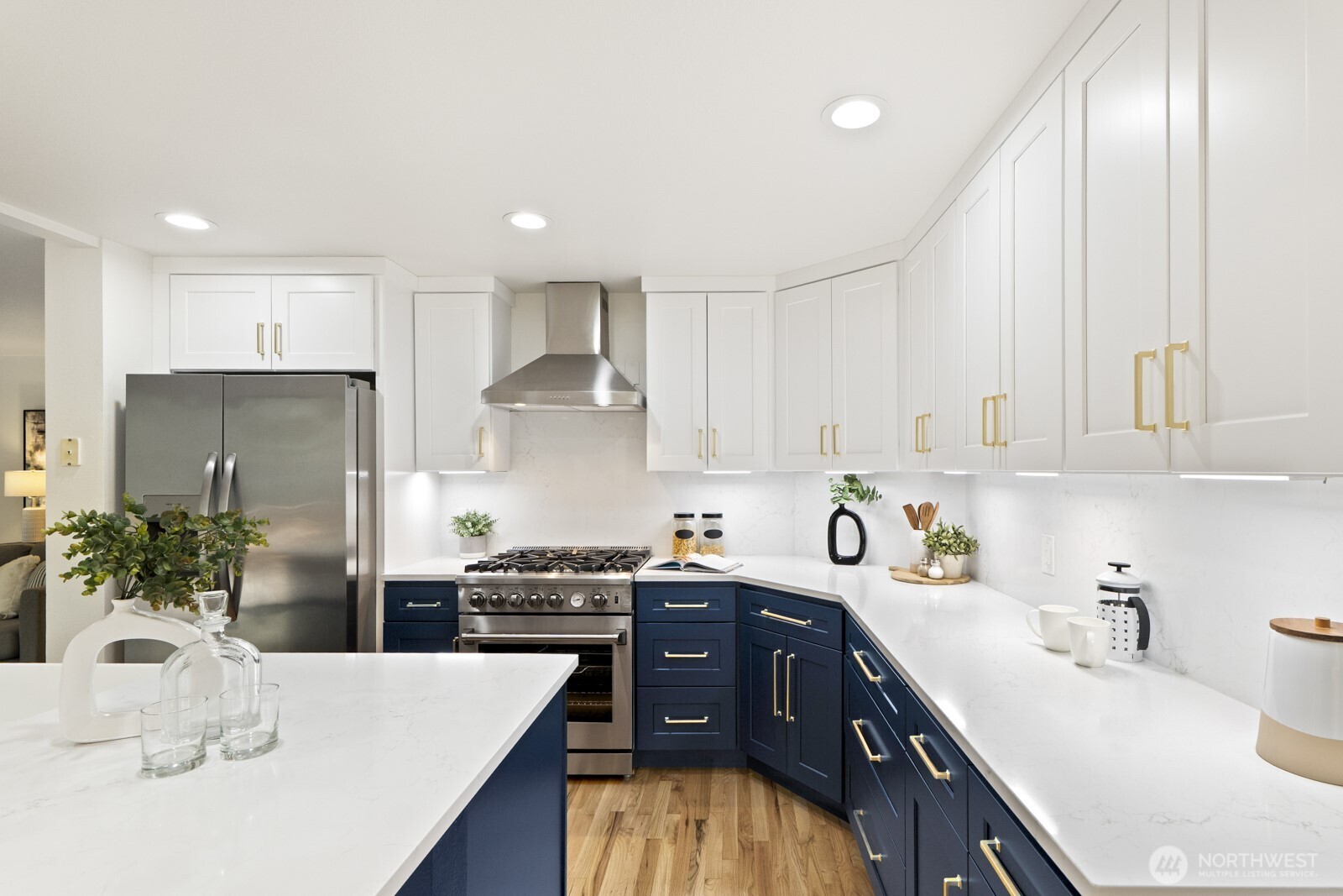 New gas range with stainless hood to inspire your inner chef.