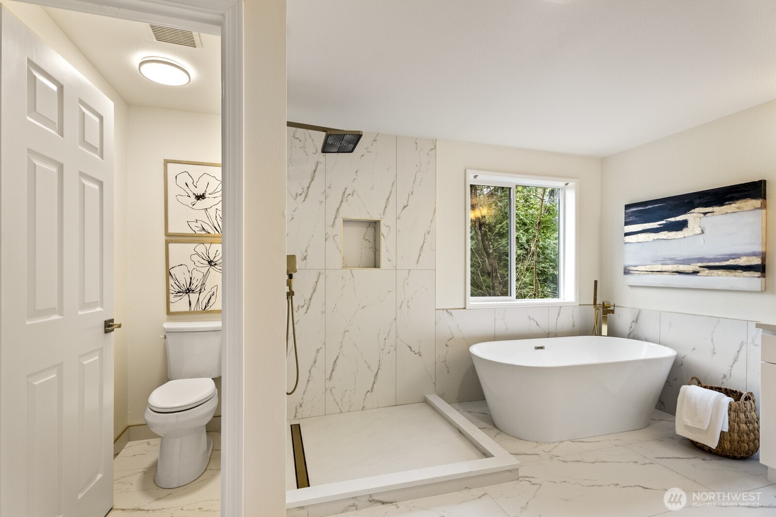 Designer tiled floor, brushed gold hardware, rain shower head and hand held, seamless shower glass (now installed).