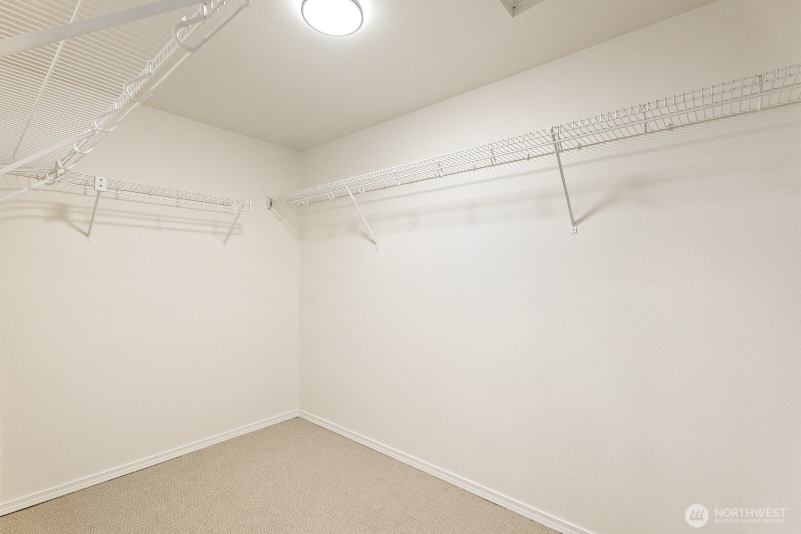 Large primary suite walk-in closet.