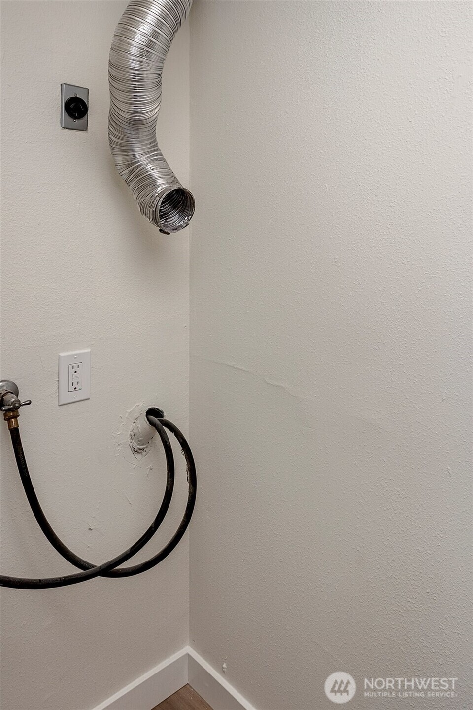 Washer and dryer hook-ups are ready for your stacked unit.