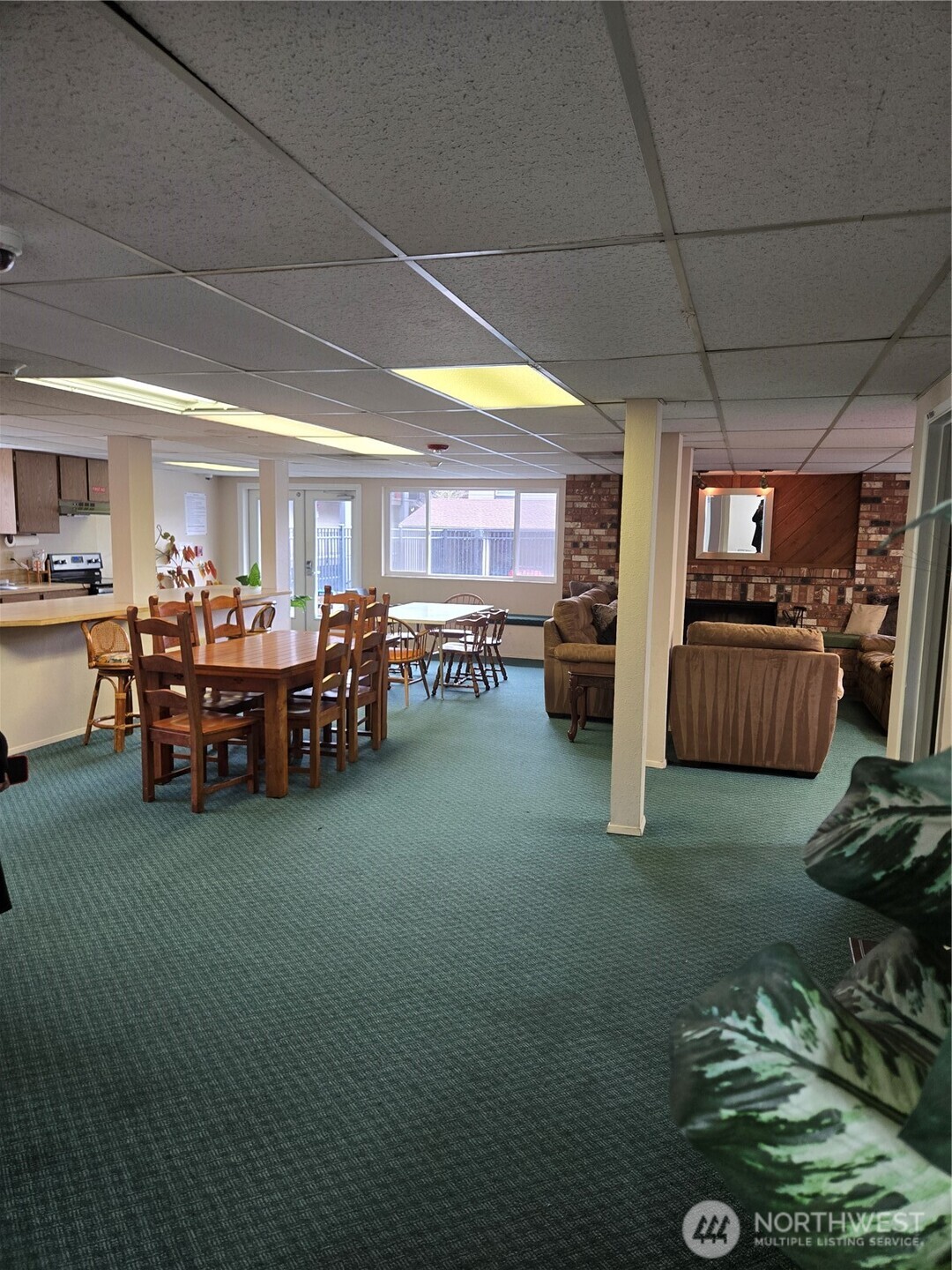 Clubhouse offers full kitchen, dining area and cozy woodburning fireplace to entertain large parties.