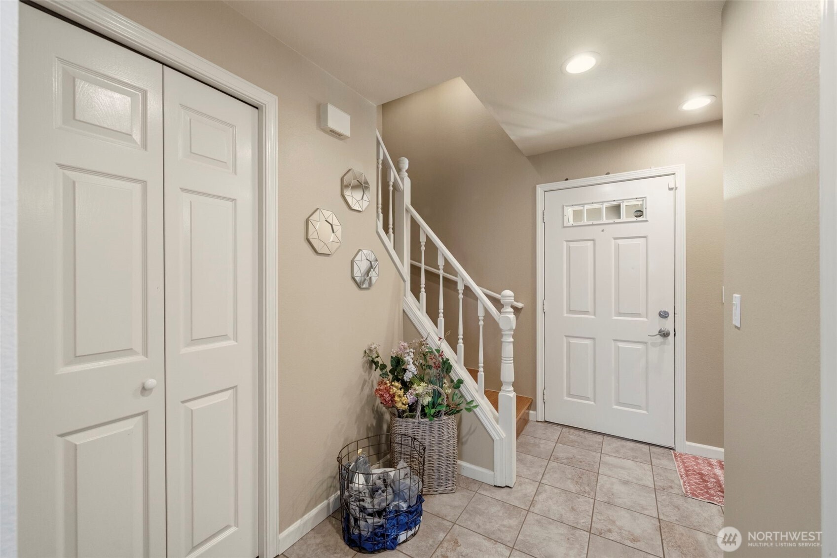 Upgraded blinds throughout the home provide privacy while allowing natural light to brighten the living spaces.