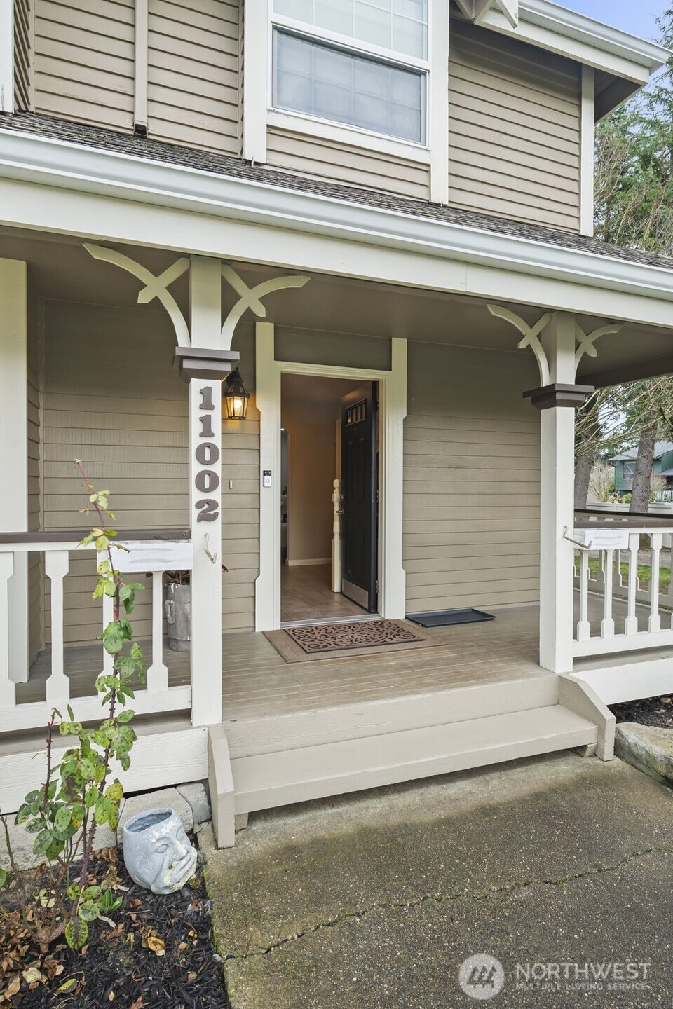 Stunning wood floors extend through the main living areas, adding warmth, durability, and timeless character to the home.