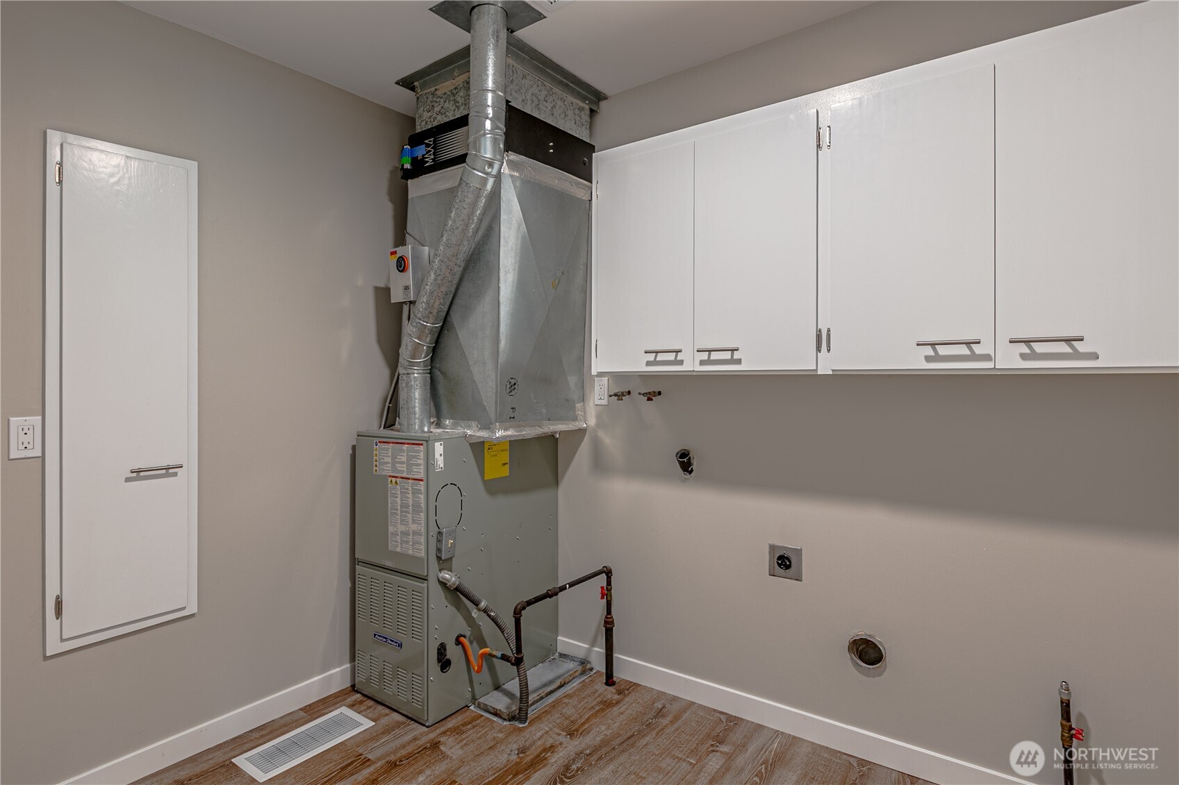 Utility Room washer and dryer are being stored in the garage.