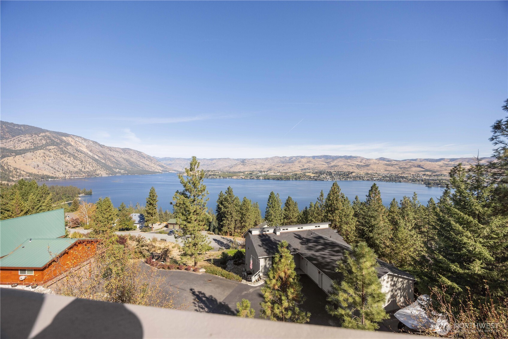 Nestled above Chelan Ridge on the South Shore of Lake Chelan with sweeping views uplake including Stormy Mountain