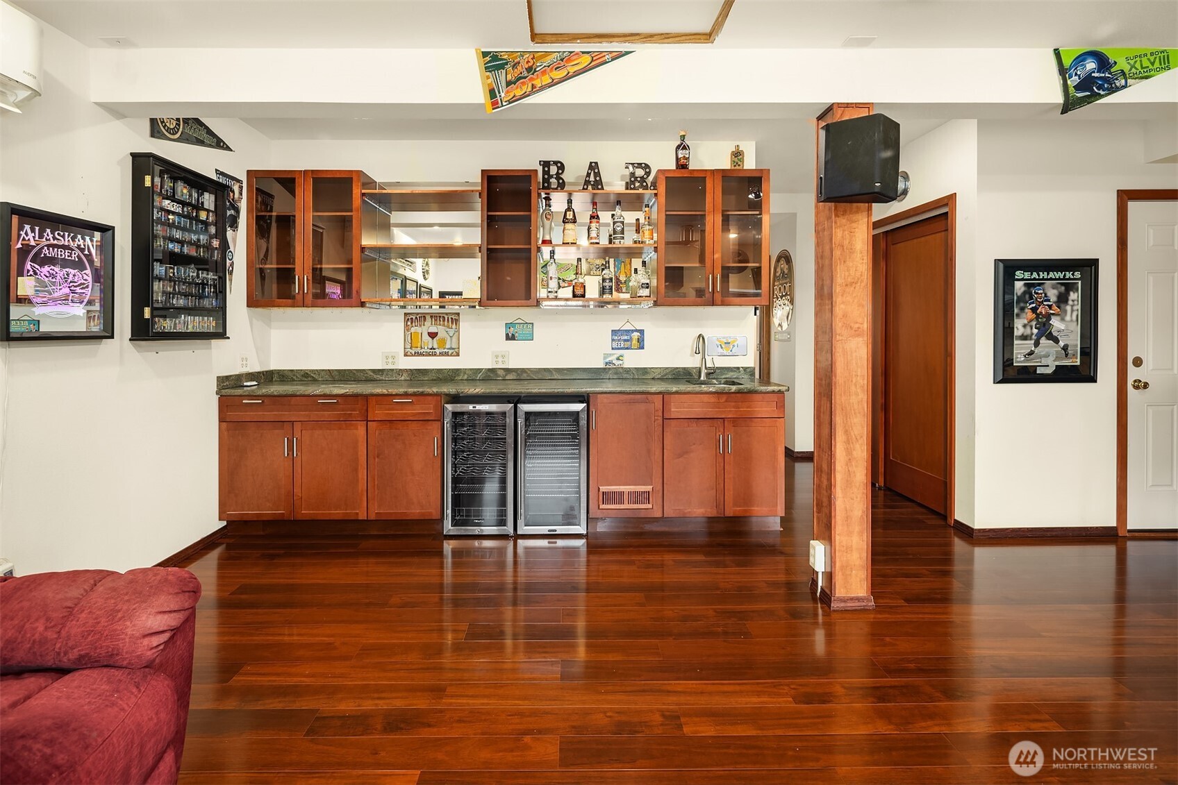 Full wet bar with fridge and room for all your bar needs.