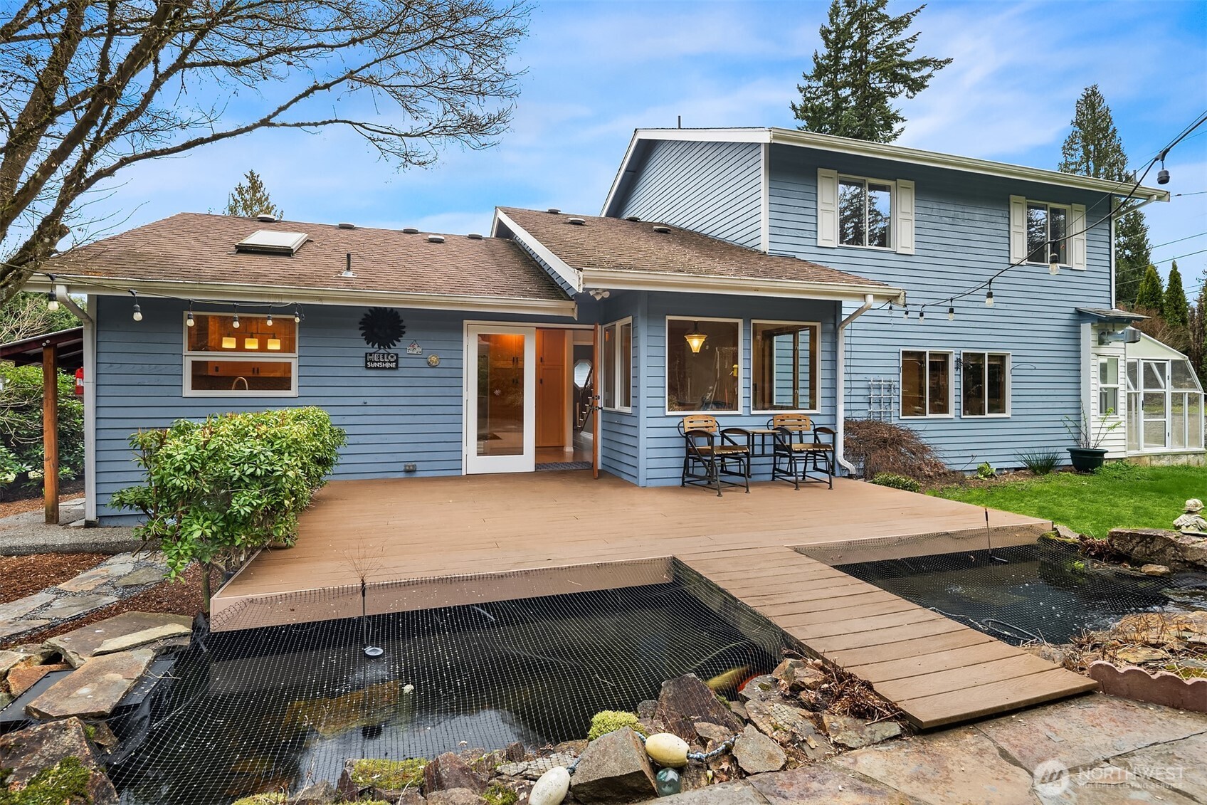 The large back deck with room for table and chairs