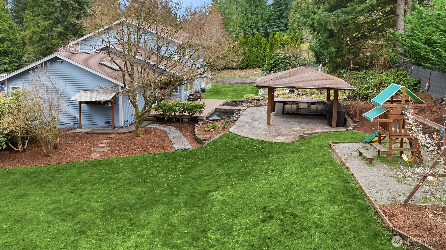 Flat grass area for playing and entertaining.
