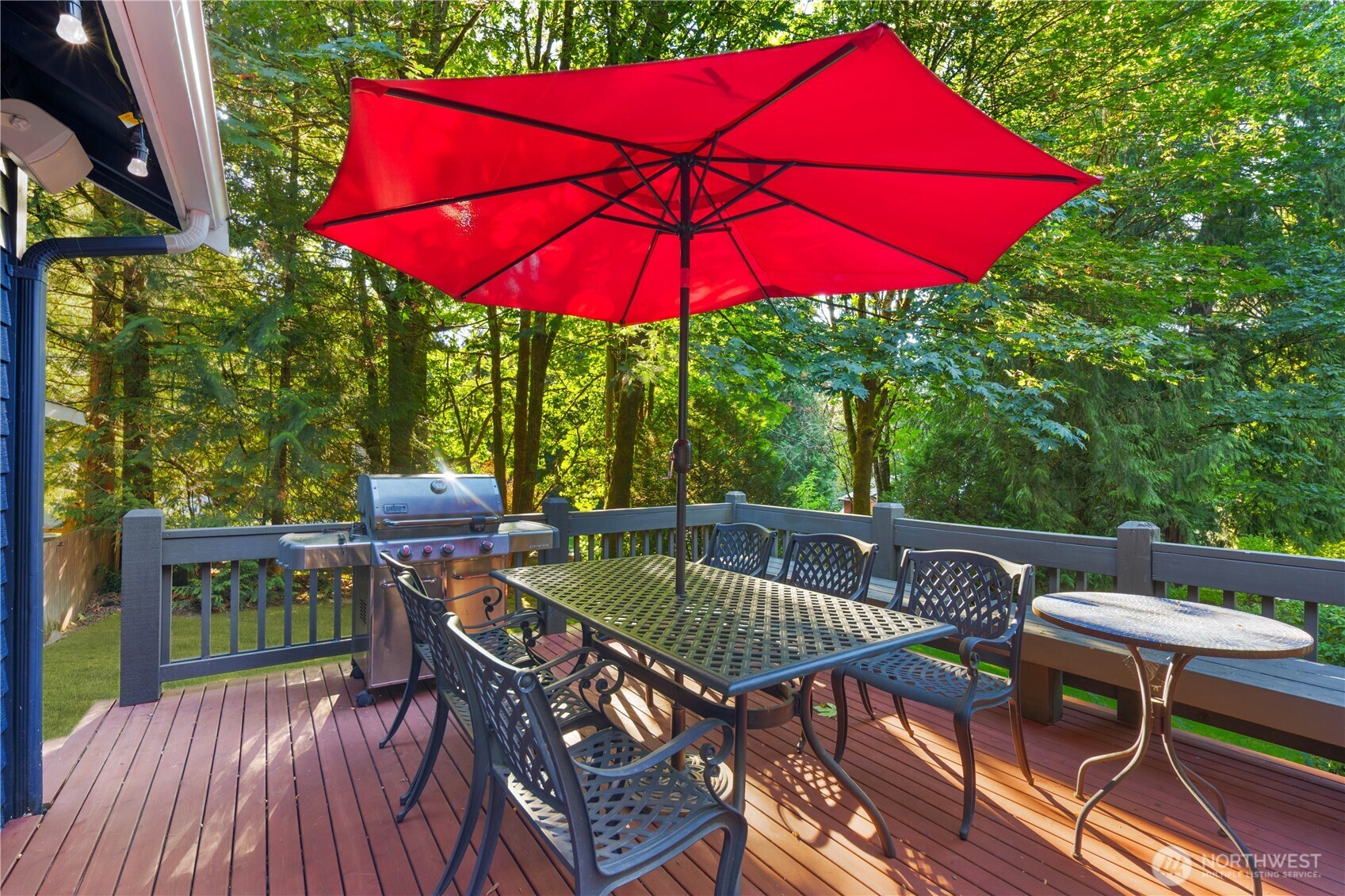 Secluded outdoor spa nestled among the trees for the ultimate private relaxation experience.