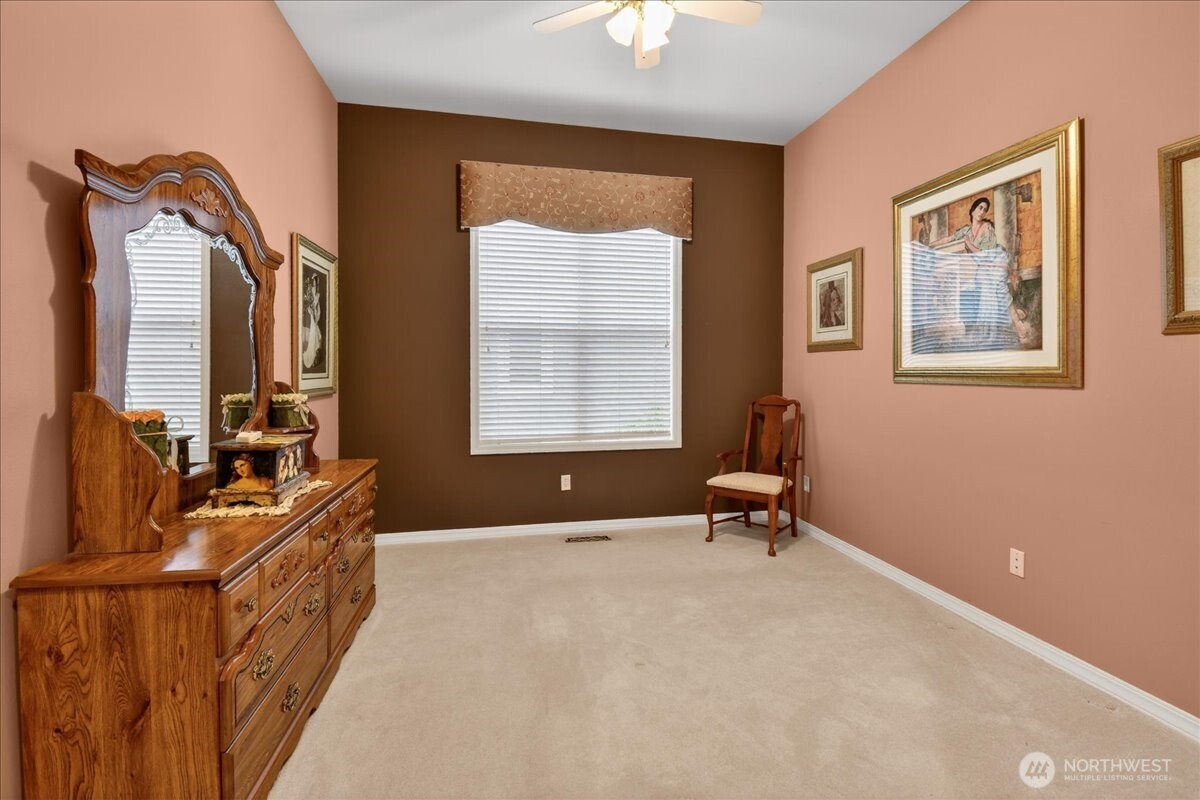 Your dream laundry room provides abundant storage, wash basin, folding counter, custom paint, Solar tube, and a fabulous set of Kenmore Elite front load washer and dryer.