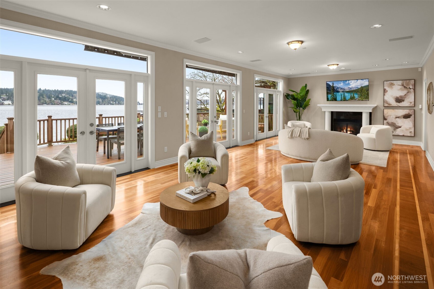 Lake Washington views stretch across the living spaces with seamless access to the deck.