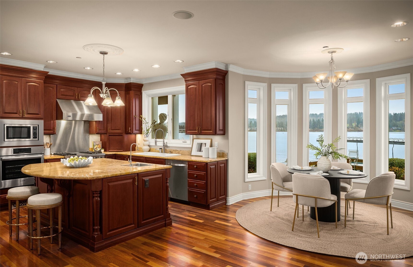 Breakfast area wrapped in windows overlooking Lake Washington.